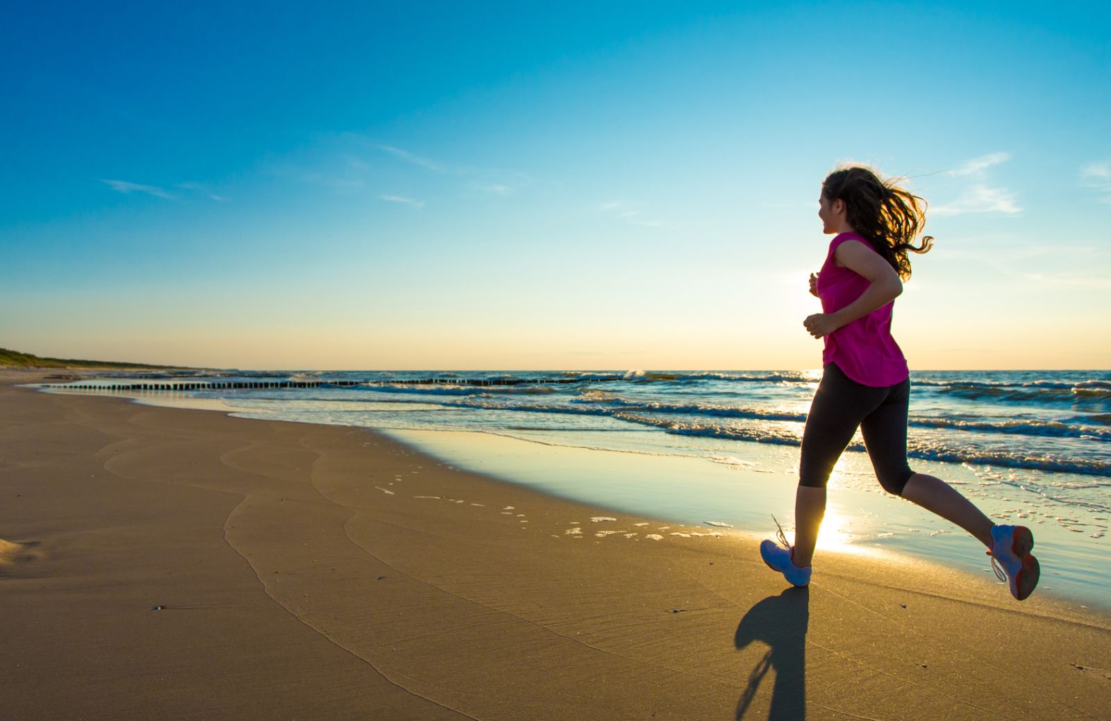 Correre in spiaggia: con o senza scarpe?