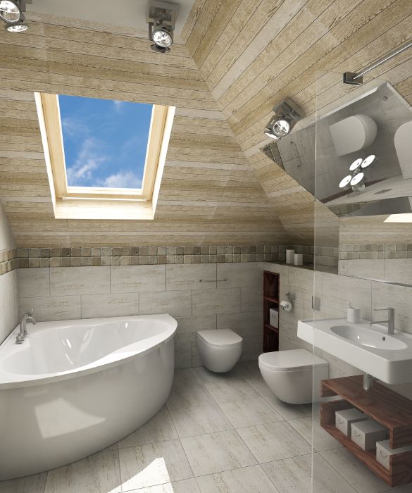 Se dovete sistemare il bagno in una stanza mansardata, disponete la vasca sotto un lucernaio e rivestite le pareti di legno. Vi sembrerà di essere in uno chalet di montagna.