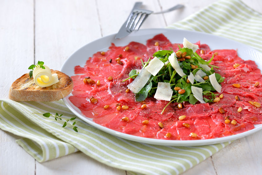 Carpaccio di manzo con rucola e grana