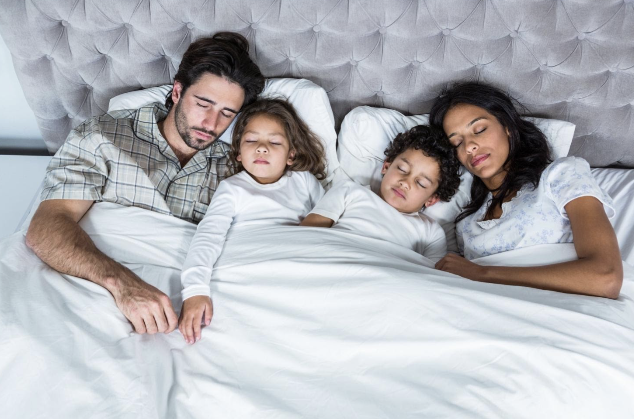 Perché fa bene dormire con i bambini
